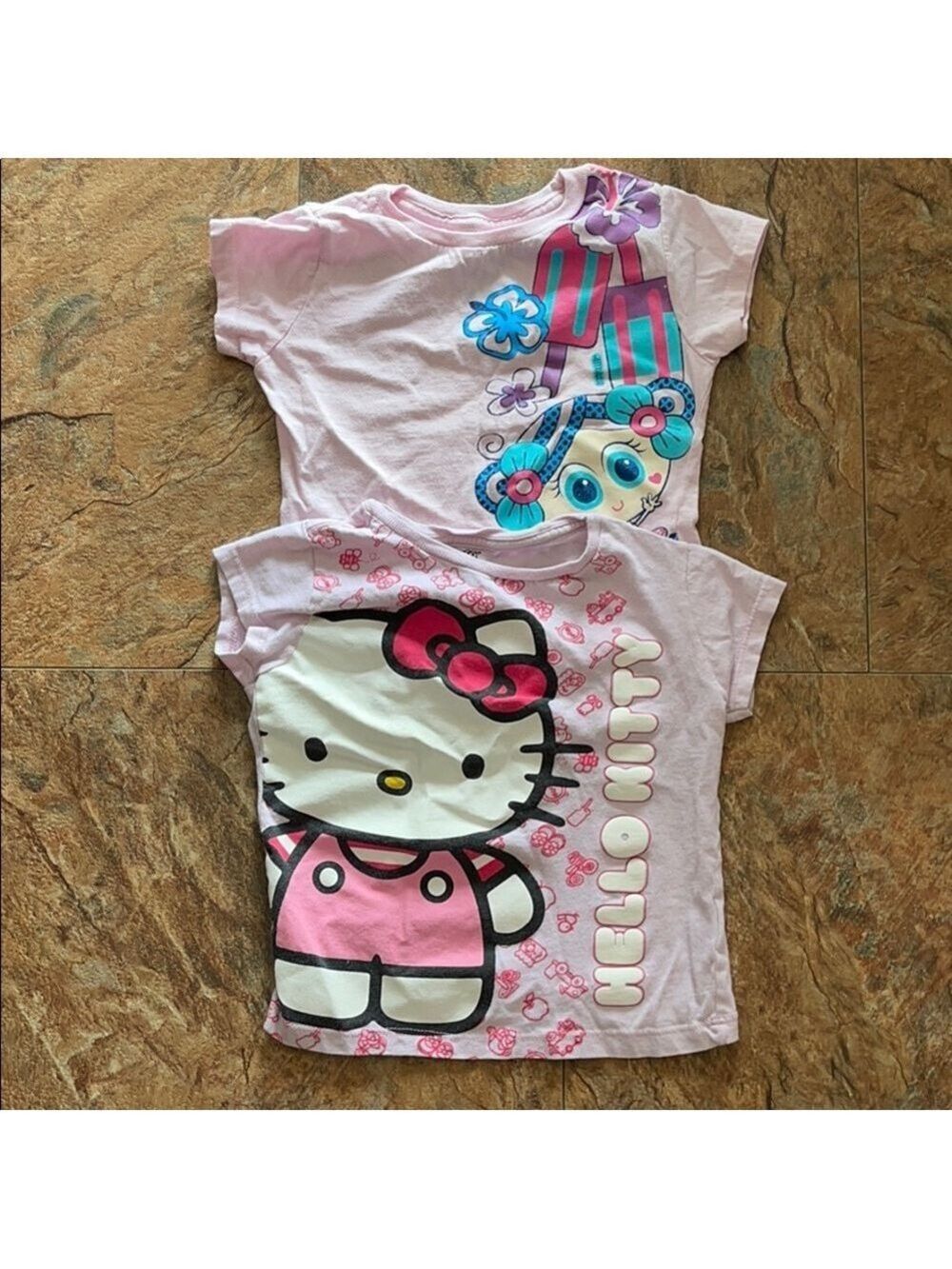 Bundle of 2 kids t-shirts size 6.